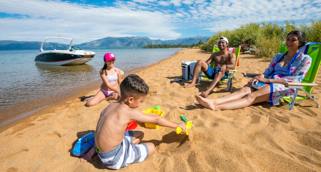 Family relaxing on beach