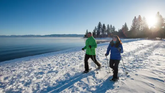Snowshoeing on shore of Lake Tahoe